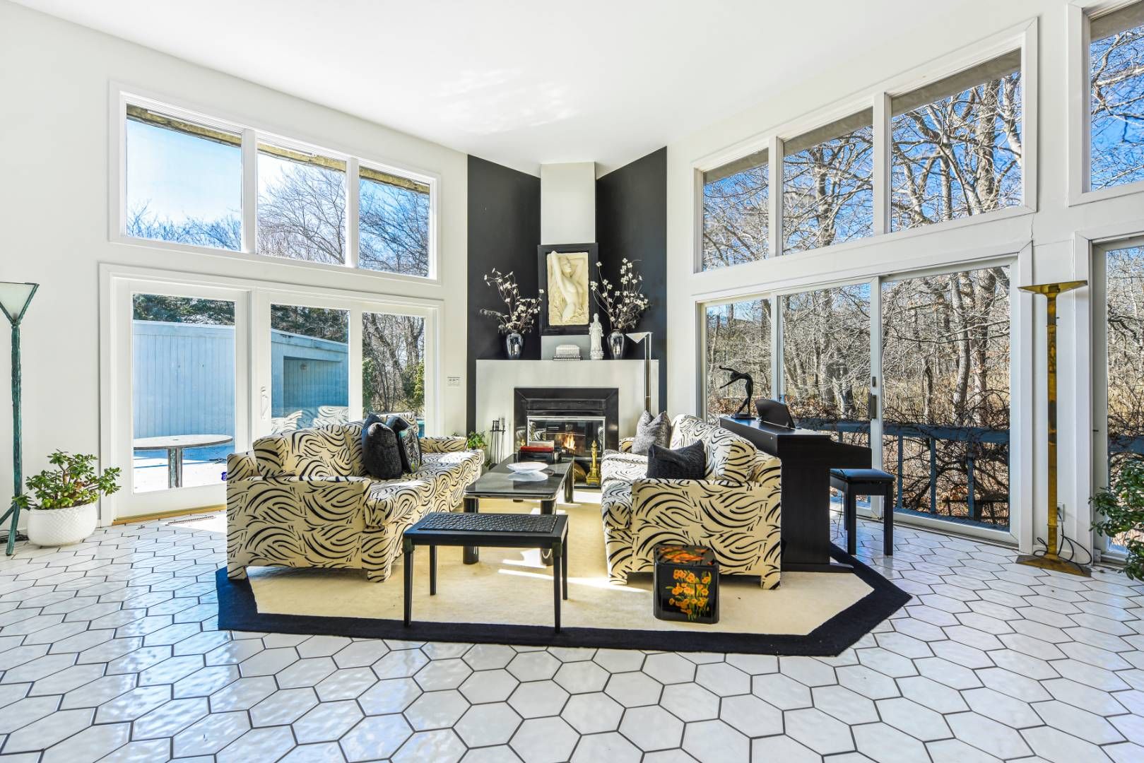 45 South Country Road Westhampton, NY 11977 - Photo 6 of 22 a living room with fireplace furniture and a large window