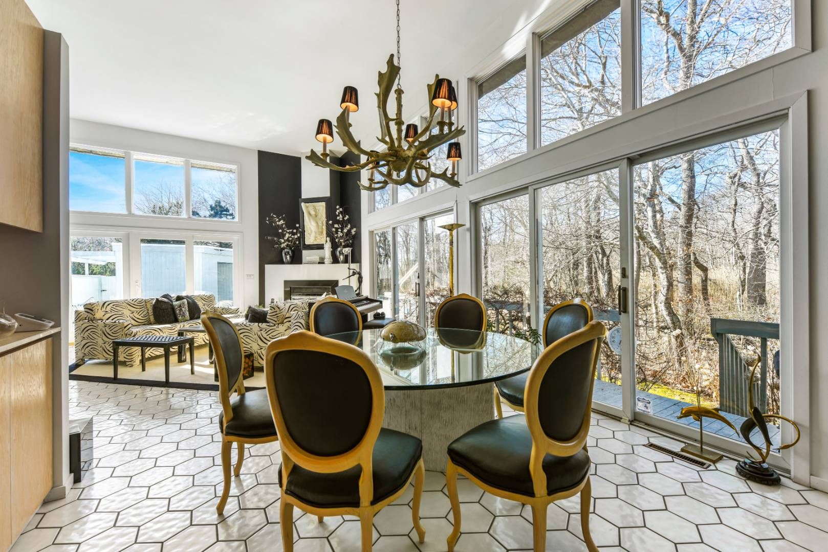 45 South Country Road Westhampton, NY 11977 - Photo 7 of 22 a living room with fireplace furniture and a large window