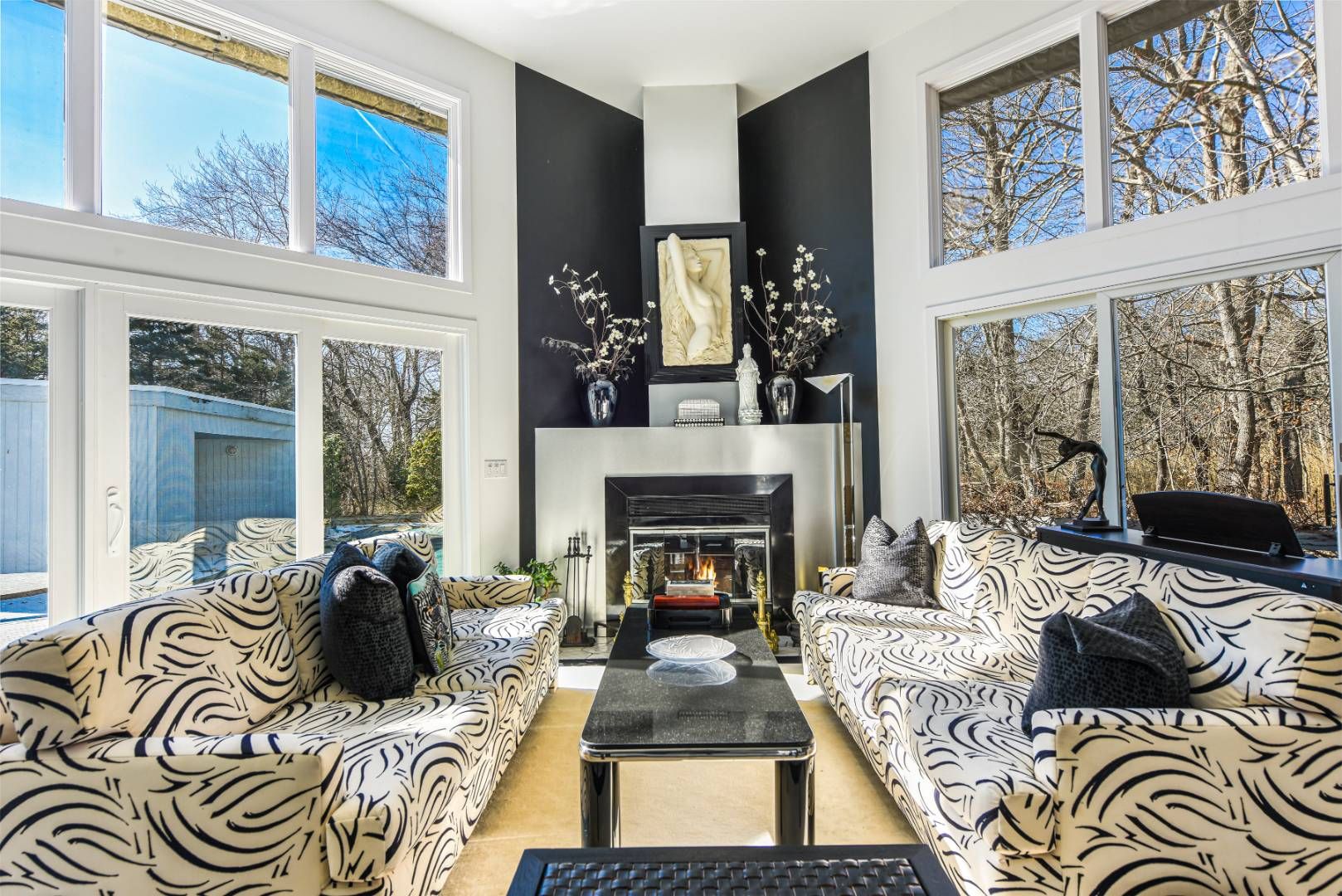 45 South Country Road Westhampton, NY 11977 - Photo 8 of 22 a living room with furniture fireplace and flat screen tv