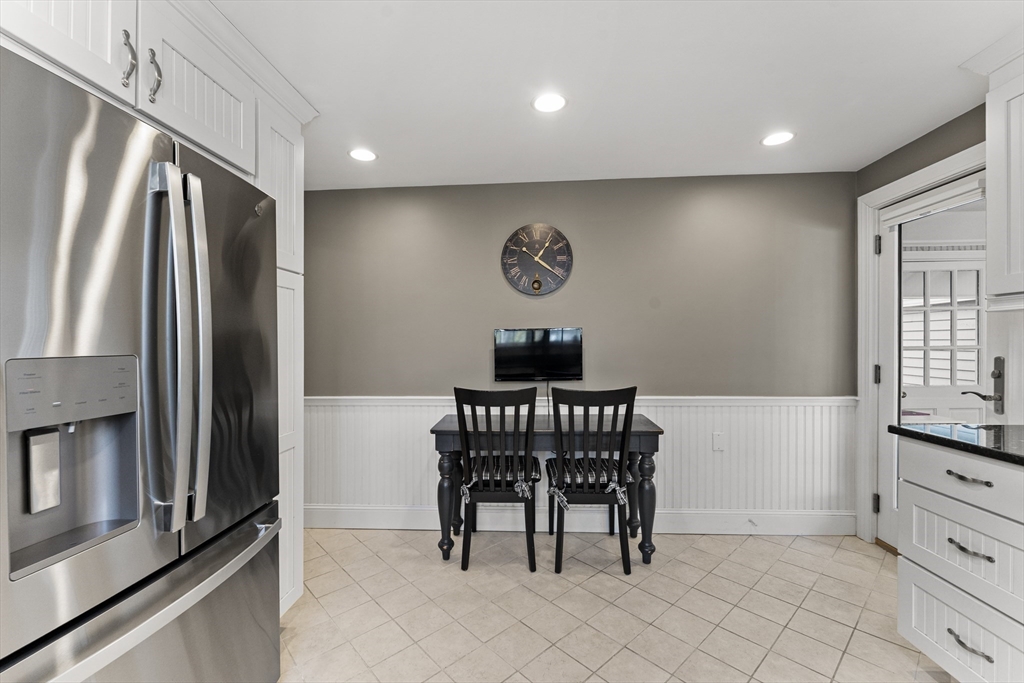 1052 Greendale Avenue Needham, MA 02492 - Photo 11 of 42 a view of kitchen with furniture and refrigerator