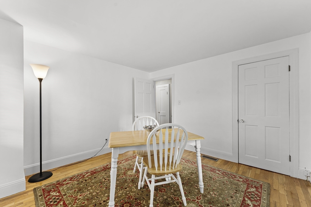 1052 Greendale Avenue Needham, MA 02492 - Photo 16 of 42 a view of a livingroom with furniture and wooden floor