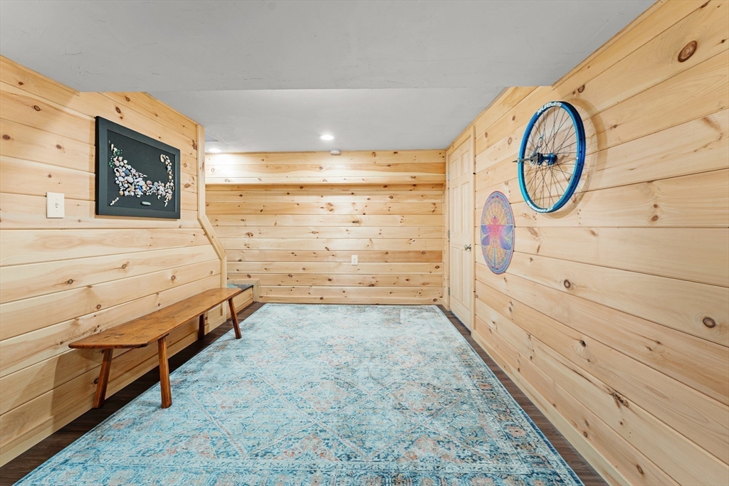 1052 Greendale Avenue Needham, MA 02492 - Photo 30 of 42 a view of a bathroom with sink and a mirror
