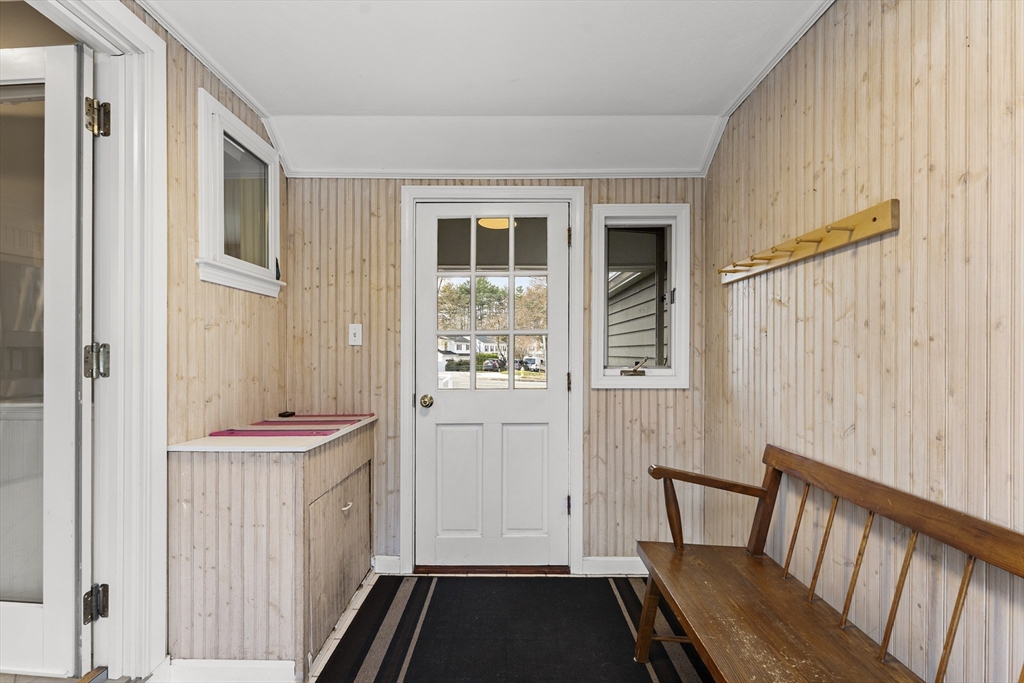 1052 Greendale Avenue Needham, MA 02492 - Photo 32 of 42 a bathroom with a sink and a mirror