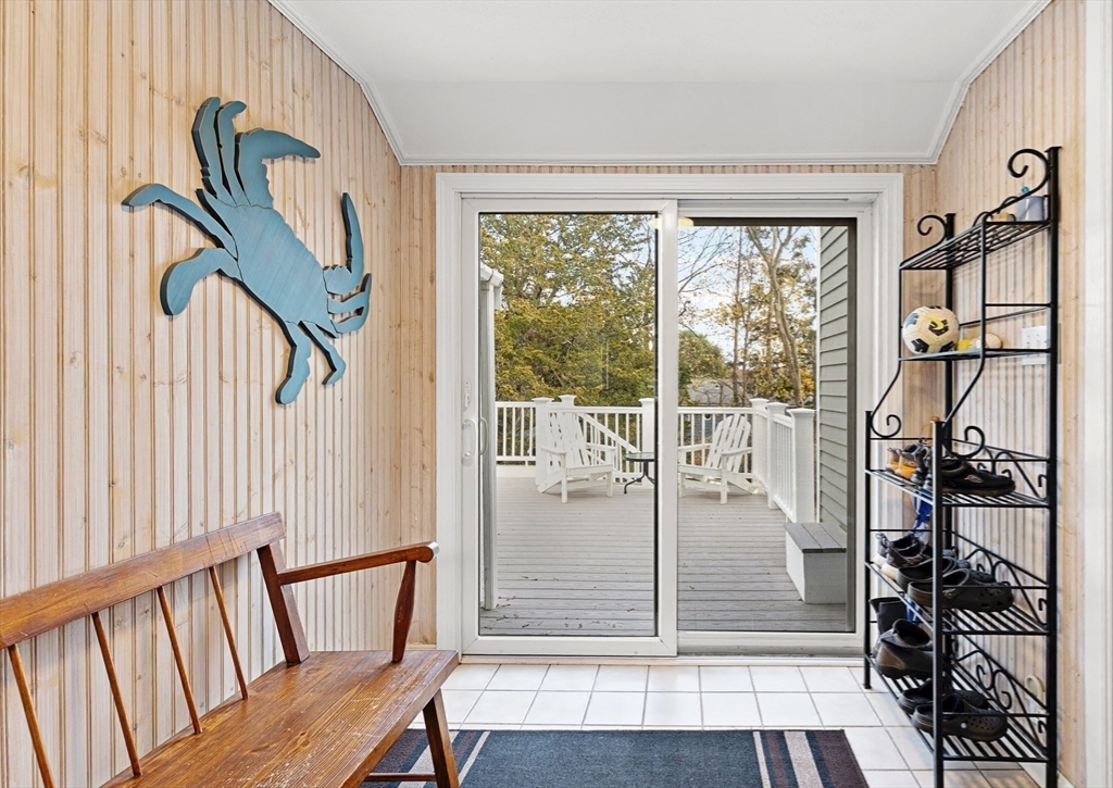 1052 Greendale Avenue Needham, MA 02492 - Photo 33 of 42 a view of a porch with wooden floor and a floor to ceiling window