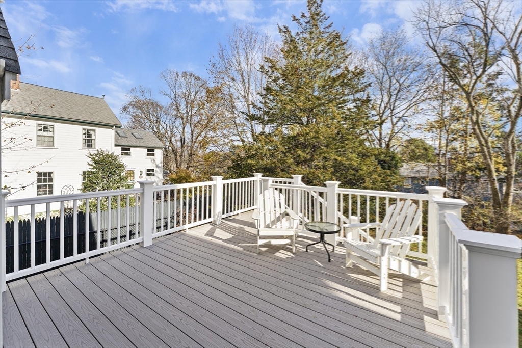 1052 Greendale Avenue Needham, MA 02492 - Photo 35 of 42 a view of deck with furniture and trees