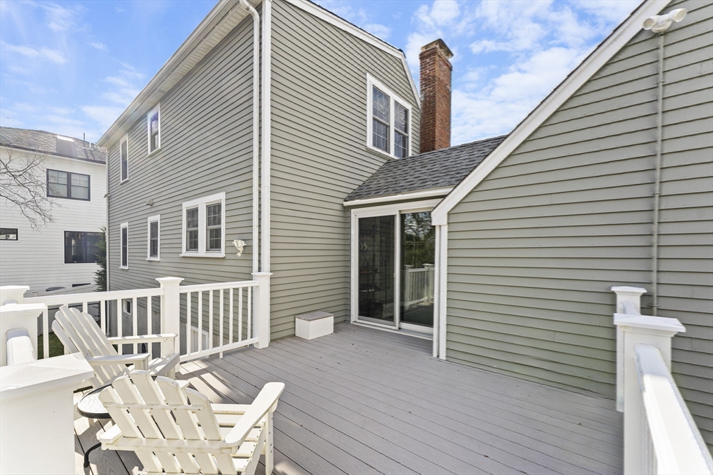 1052 Greendale Avenue Needham, MA 02492 - Photo 37 of 42 a view of a house with wooden deck