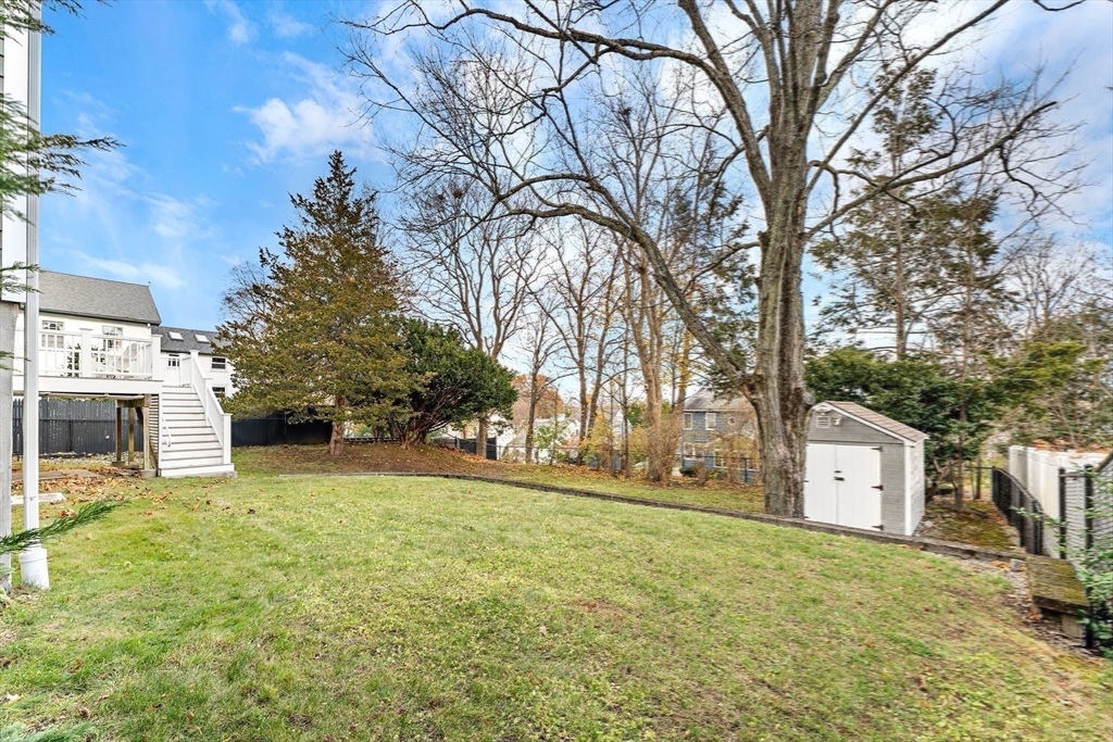 1052 Greendale Avenue Needham, MA 02492 - Photo 38 of 42 a house with trees in front of it