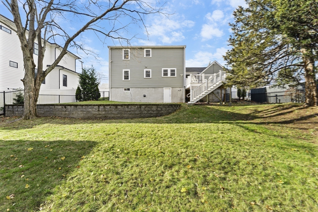 1052 Greendale Avenue Needham, MA 02492 - Photo 40 of 42 a view of a house with a yard
