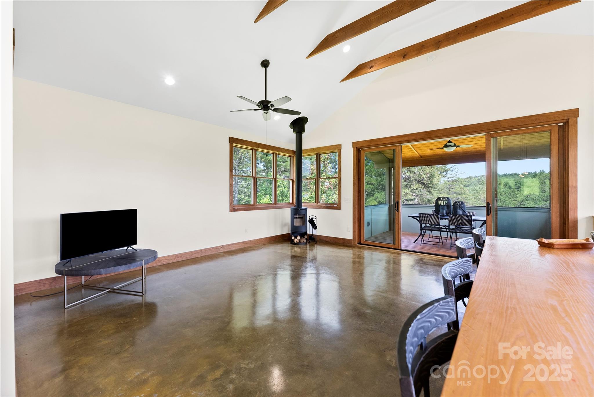 13 New Home Road Marshall, NC 28753 - Photo 18 of 48 a view of a livingroom with furniture wooden floor and windows