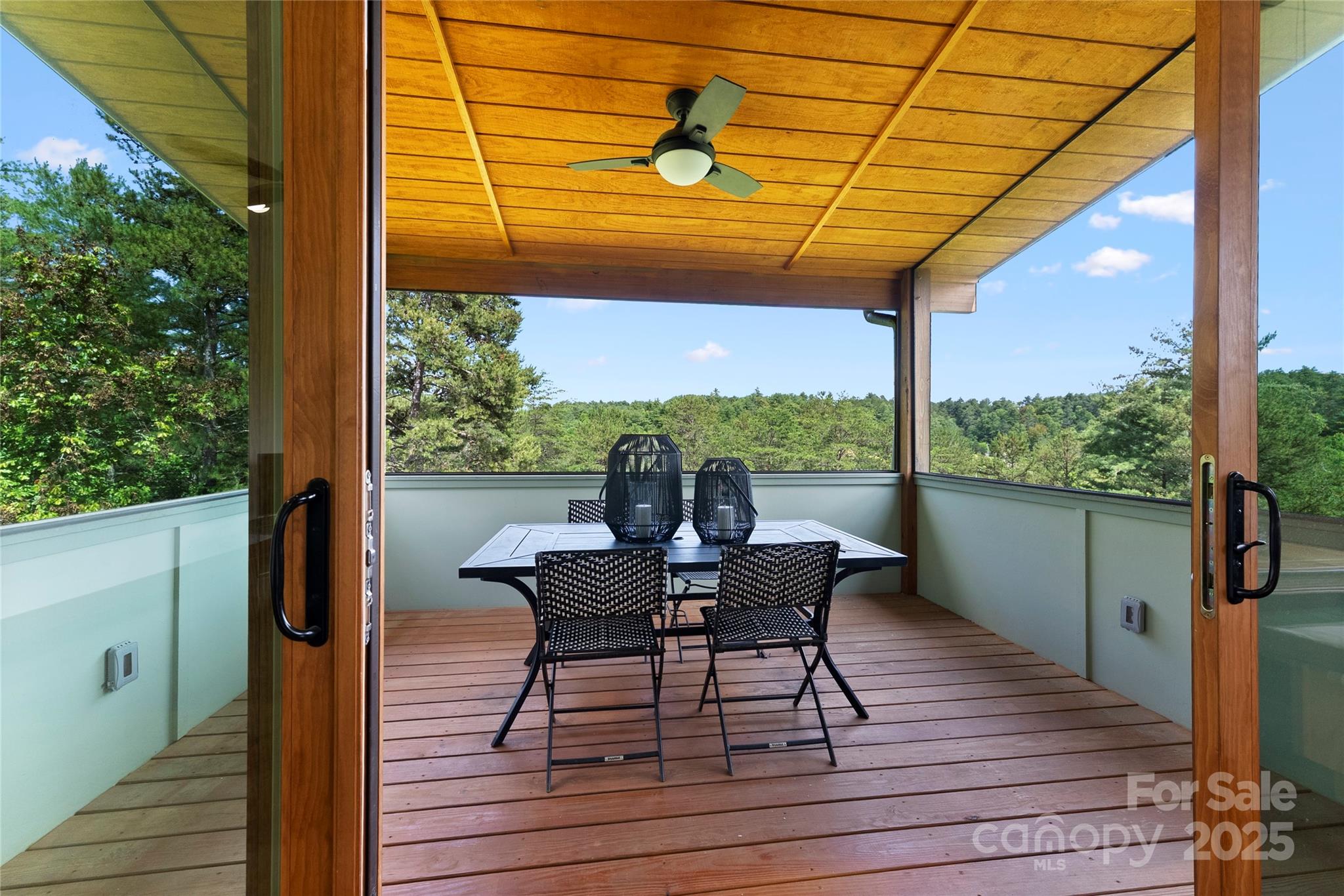 13 New Home Road Marshall, NC 28753 - Photo 22 of 48 a view of a porch with furniture and wooden floor