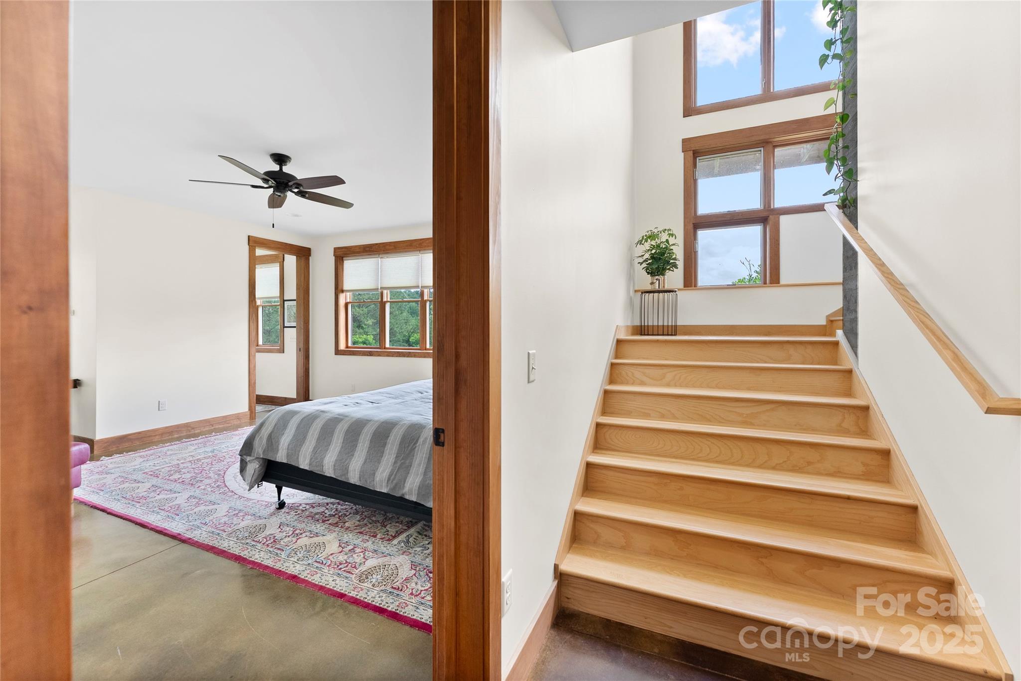 13 New Home Road Marshall, NC 28753 - Photo 33 of 48 a view of staircase with white walls and a window