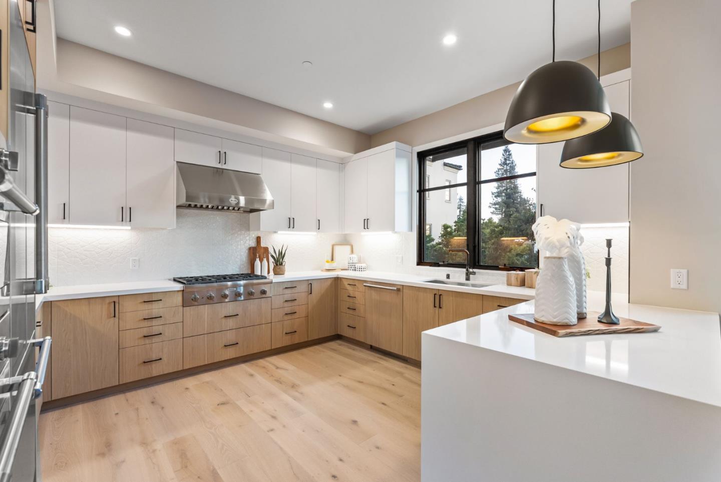 229 Hope Street Mountain View, CA 94041 - Photo 15 of 53 a kitchen with a sink stove and microwave