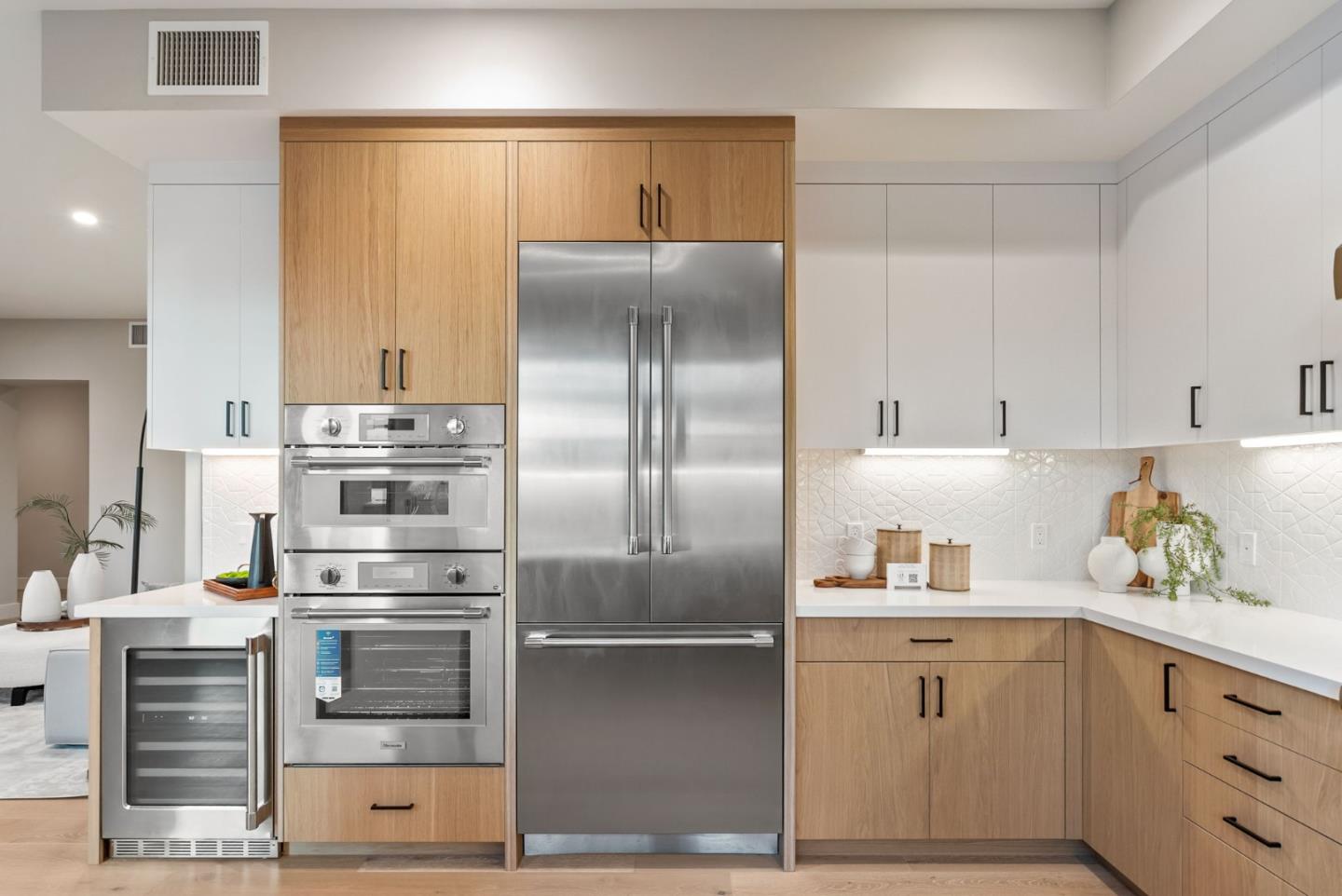 229 Hope Street Mountain View, CA 94041 - Photo 17 of 53 a kitchen with cabinets and stainless steel appliances