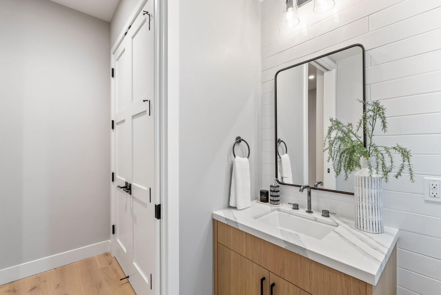 229 Hope Street Mountain View, CA 94041 - Photo 23 of 53 a bathroom with a sink and a mirror