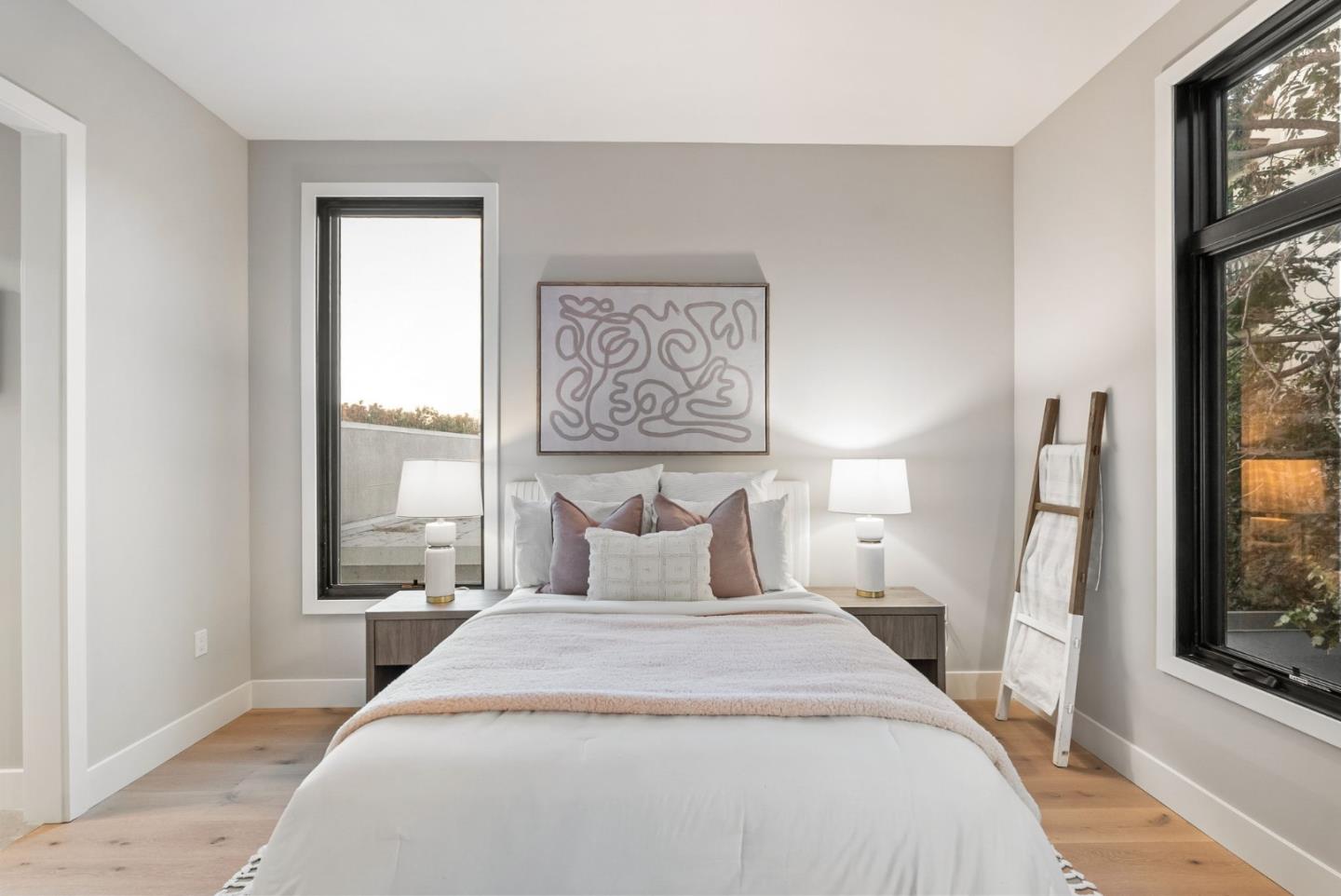 229 Hope Street Mountain View, CA 94041 - Photo 31 of 53 a bedroom with a large bed and a large window