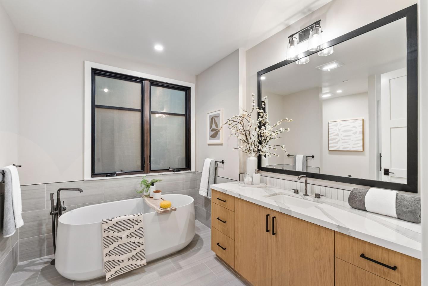 229 Hope Street Mountain View, CA 94041 - Photo 45 of 53 a bathroom with a granite countertop sink and a mirror