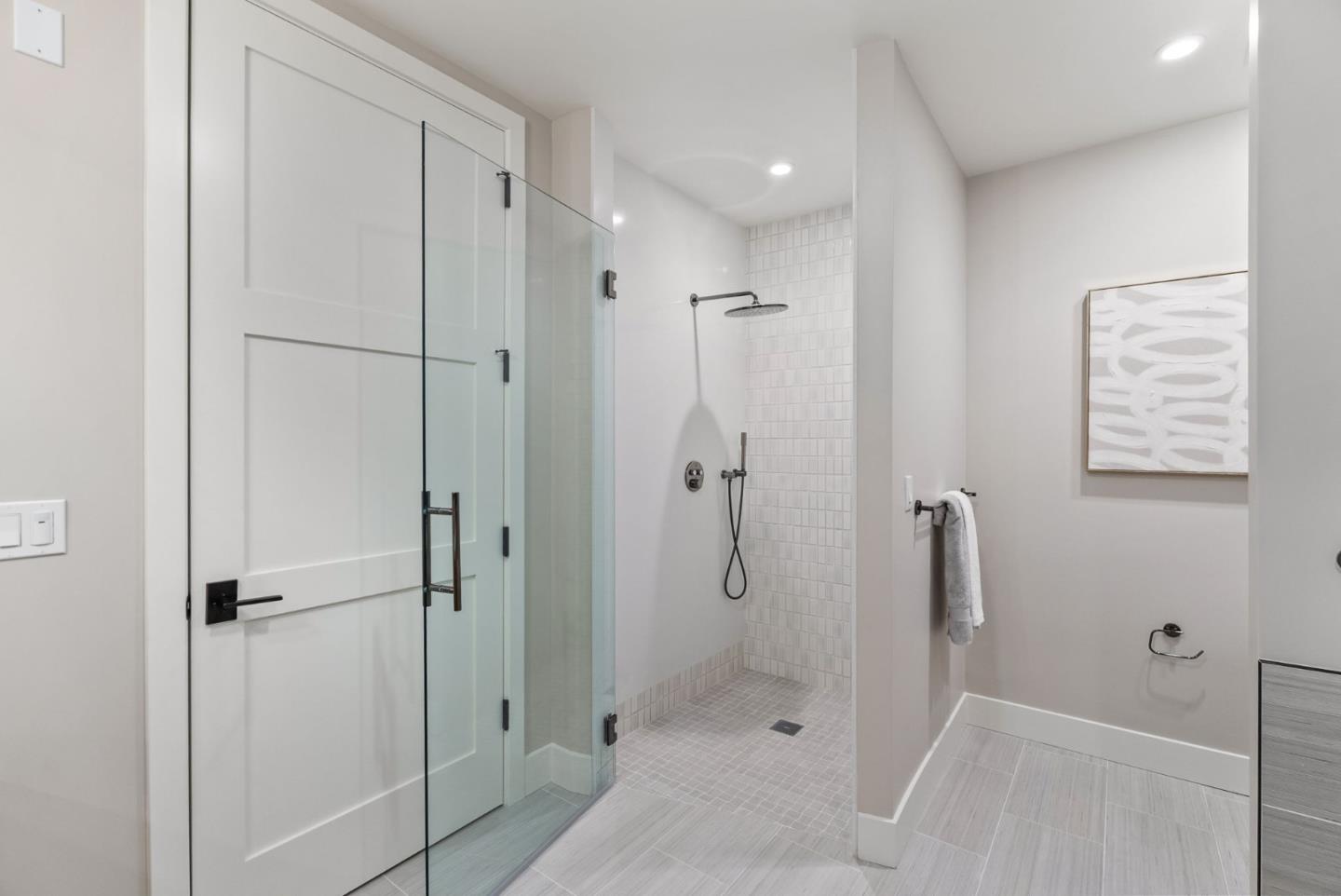 229 Hope Street Mountain View, CA 94041 - Photo 47 of 53 a bathroom with a shower and a glass door