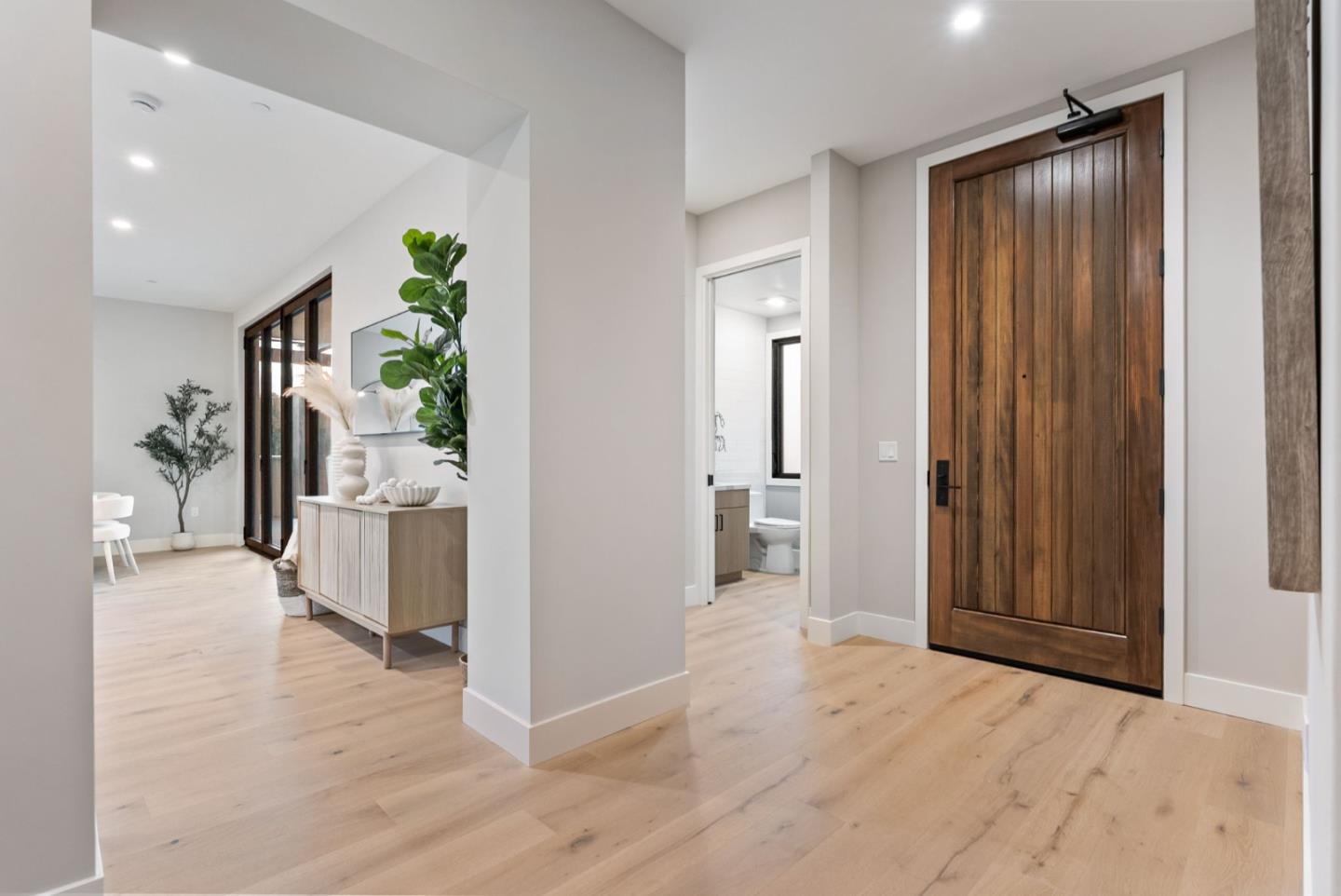 229 Hope Street Mountain View, CA 94041 - Photo 10 of 53 a view of a hallway with wooden floor and windows