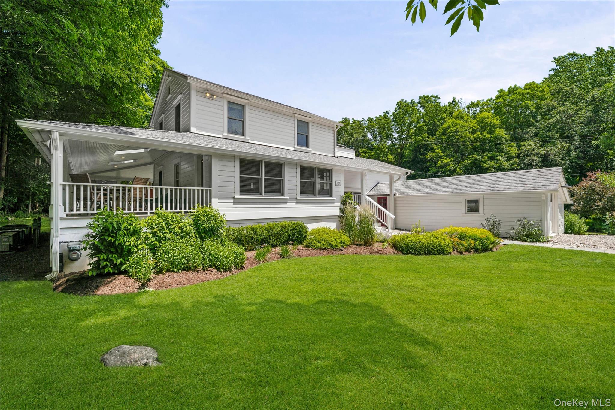 324 Haverstraw Road Suffern, NY 10901 - Photo 4 of 50 a view of a house with a back yard