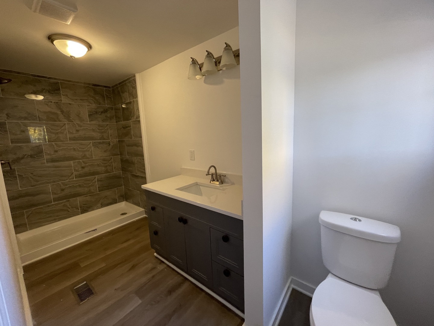 102 Candlegate Circle Matteson, IL 60443 - Photo 8 of 11 a bathroom with a granite countertop sink toilet and shower