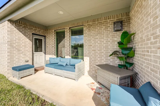 a building outdoor space with patio furniture