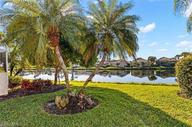 3144 Andorra Court Naples, FL 34109 - Photo 2 of 18 View of yard with a water view