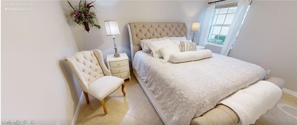3144 Andorra Court Naples, FL 34109 - Photo 7 of 18 Bedroom featuring baseboards and tile patterned floors