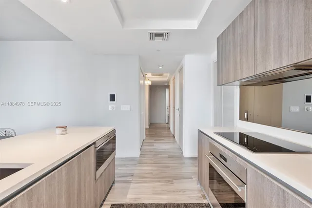 a bathroom with a sink a toilet and a bathtub