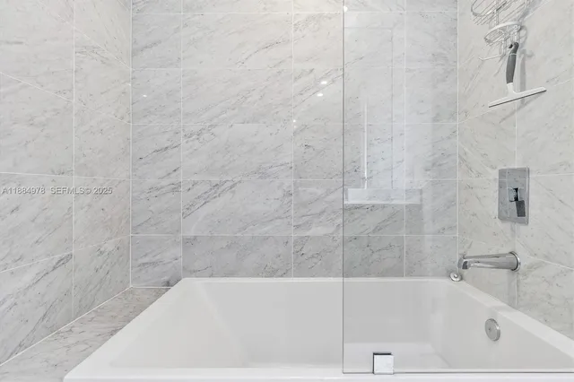 a view of a kitchen counter space and windows