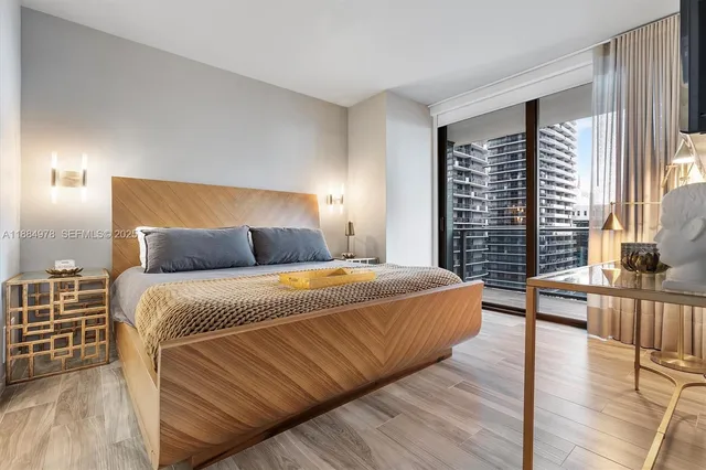 a kitchen with stainless steel appliances a sink and cabinets