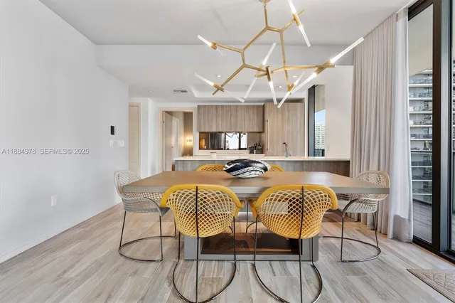 a view of balcony with wooden floor and outdoor seating