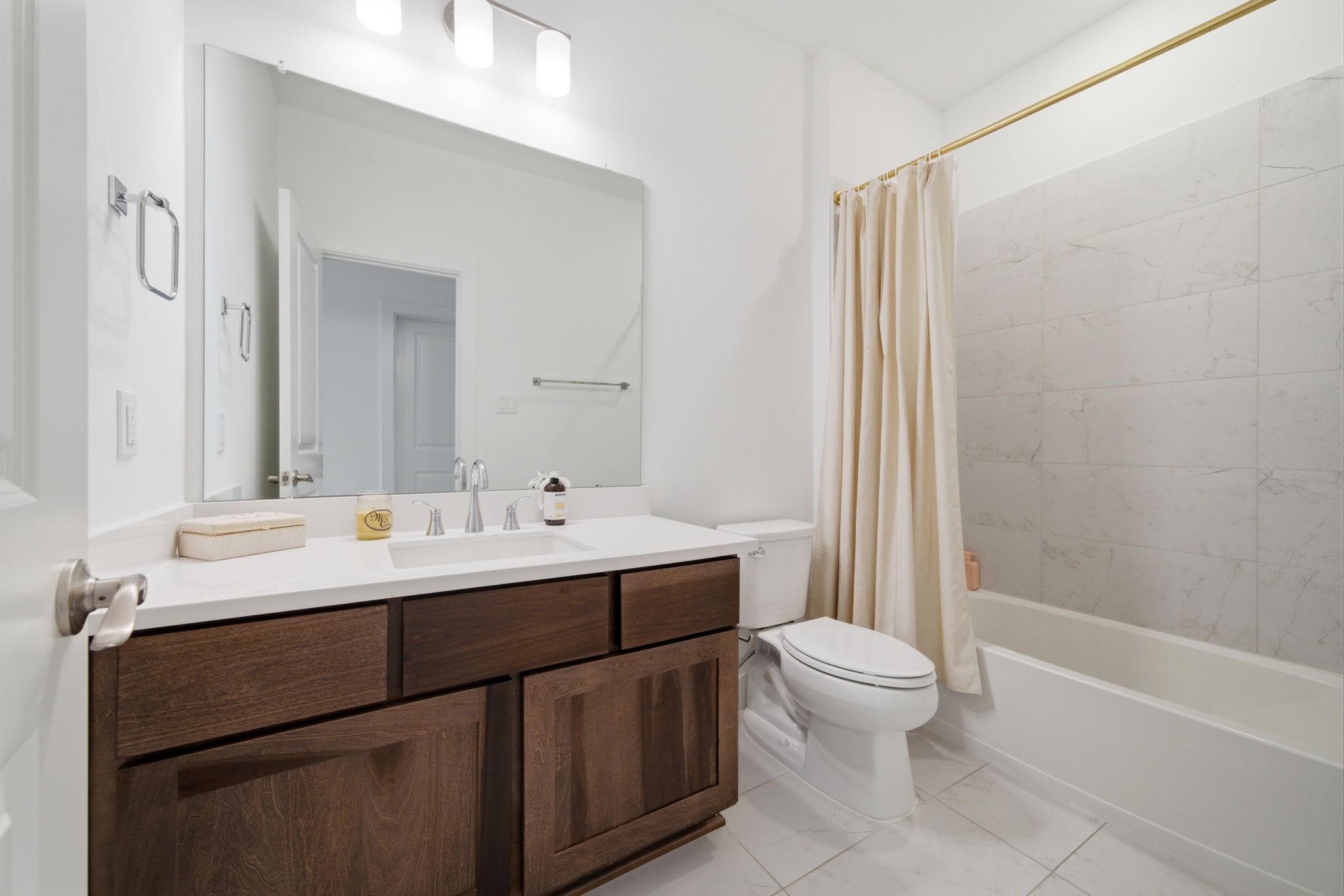 4906 Lagos Lagoon Way Spring, TX 77389 - Photo 17 of 26 a bathroom with a sink and a mirror