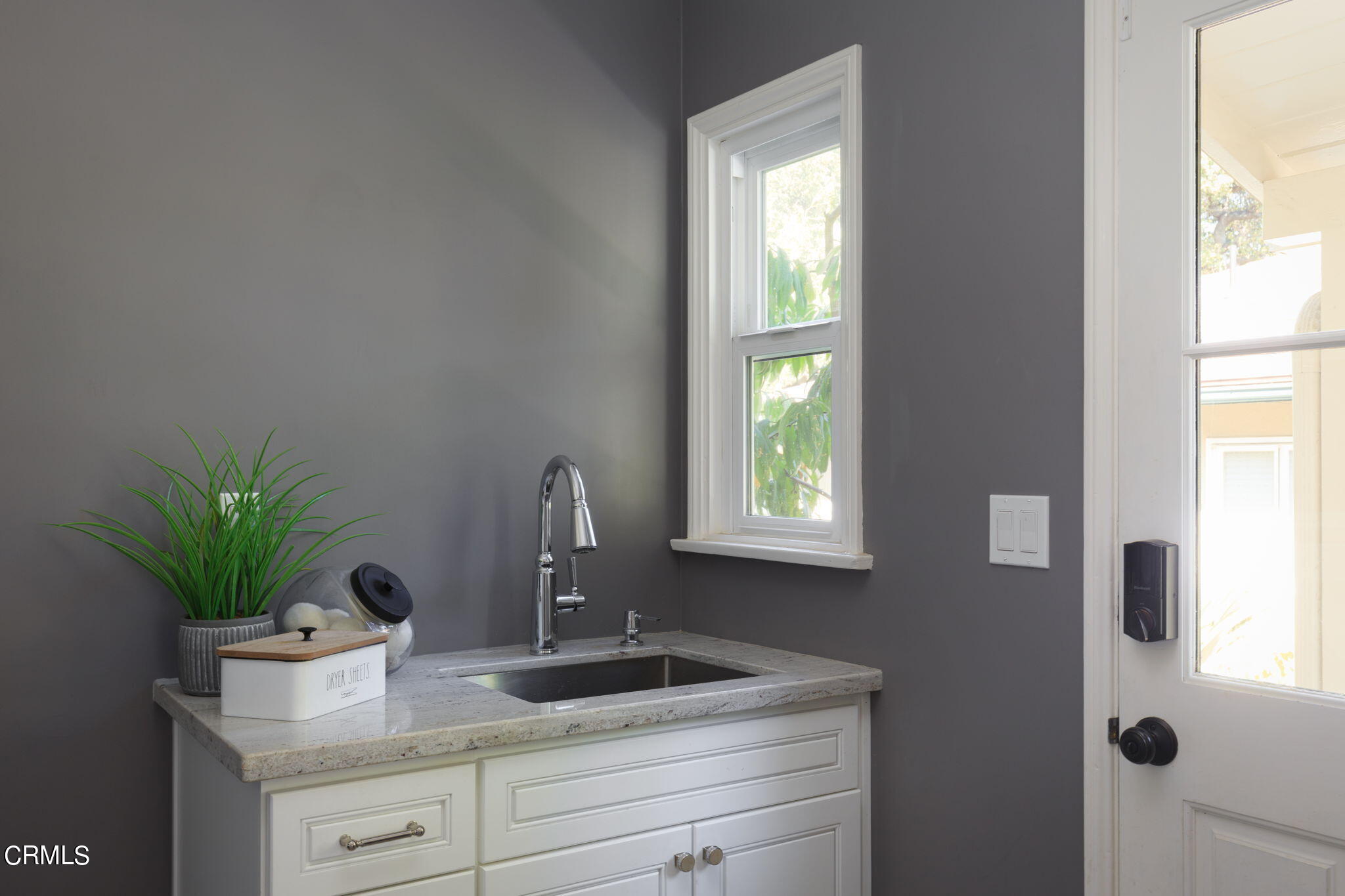 2242 Brigden Road Pasadena, CA 91104 - Photo 15 of 32 a bathroom with a potted plant on the counter and sink
