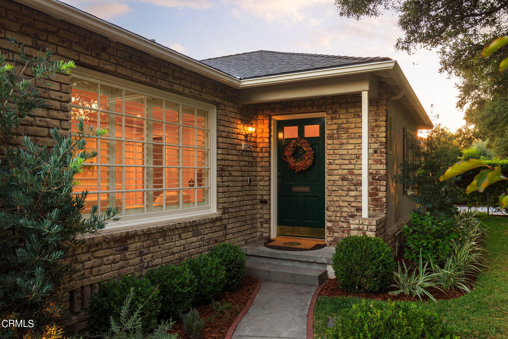 2242 Brigden Road Pasadena, CA 91104 - Photo 2 of 32 a front view of a house with a yard