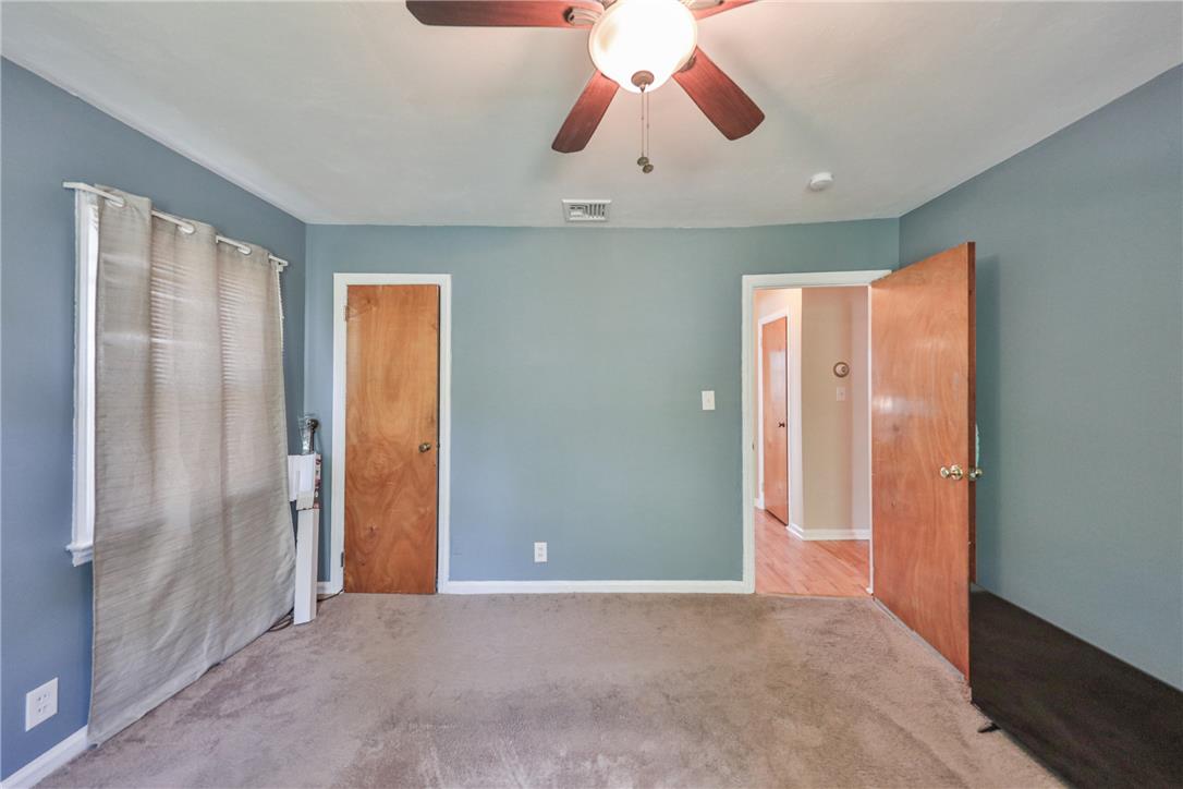 3050 Cornwall Road Bethlehem, PA 18017 - Photo 33 of 80 A well-lit interior space features soft carpeting and light blue walls.