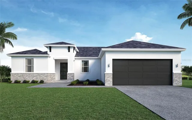 a front view of a house with a yard and garage