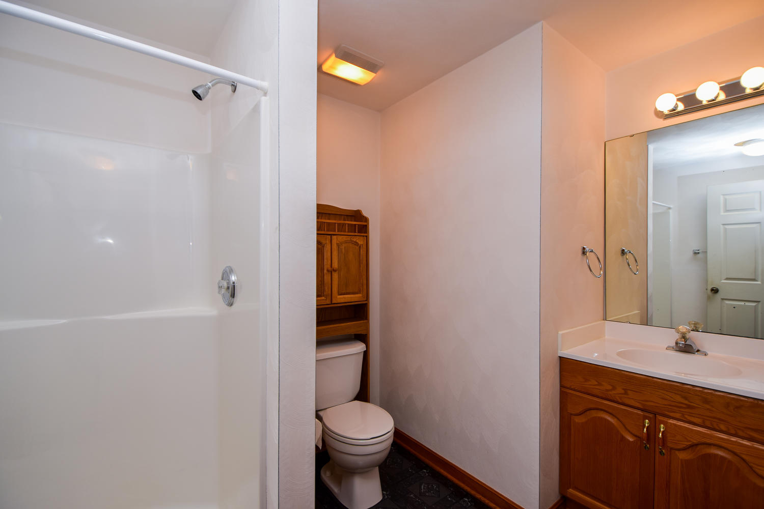 953 Webster Road Roanoke, VA 24012 - Photo 20 of 34 a bathroom with a sink and a mirror