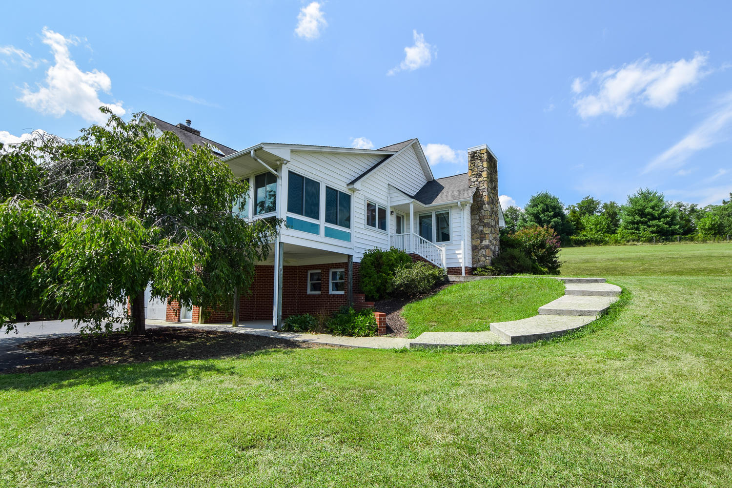 953 Webster Road Roanoke, VA 24012 - Photo 23 of 34 a front view of a house with a yard