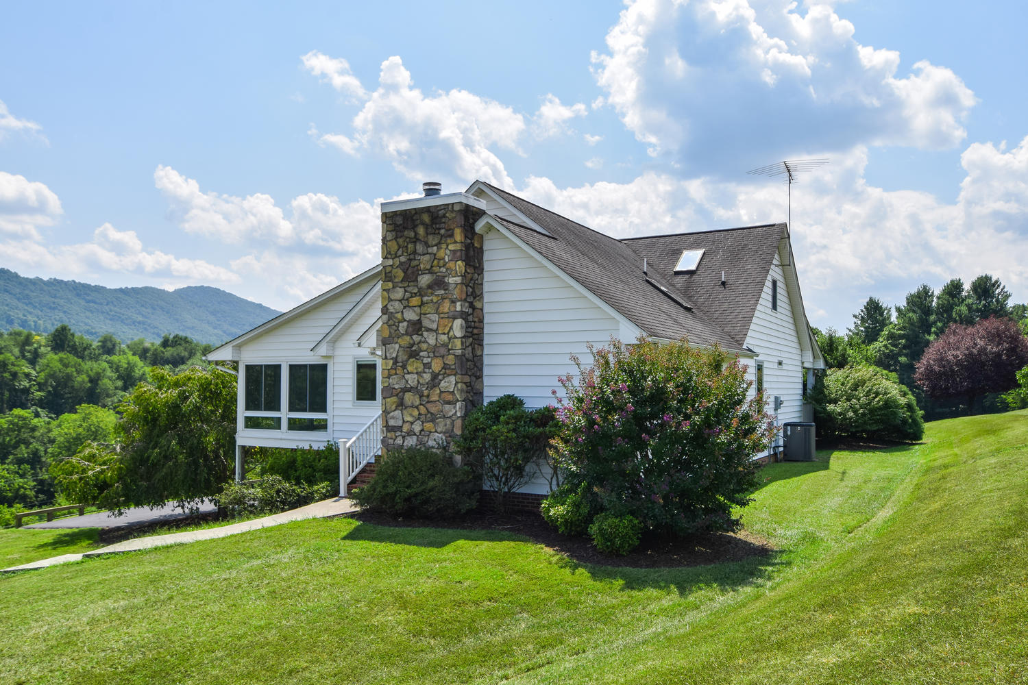 953 Webster Road Roanoke, VA 24012 - Photo 25 of 34 a view of a house with a yard