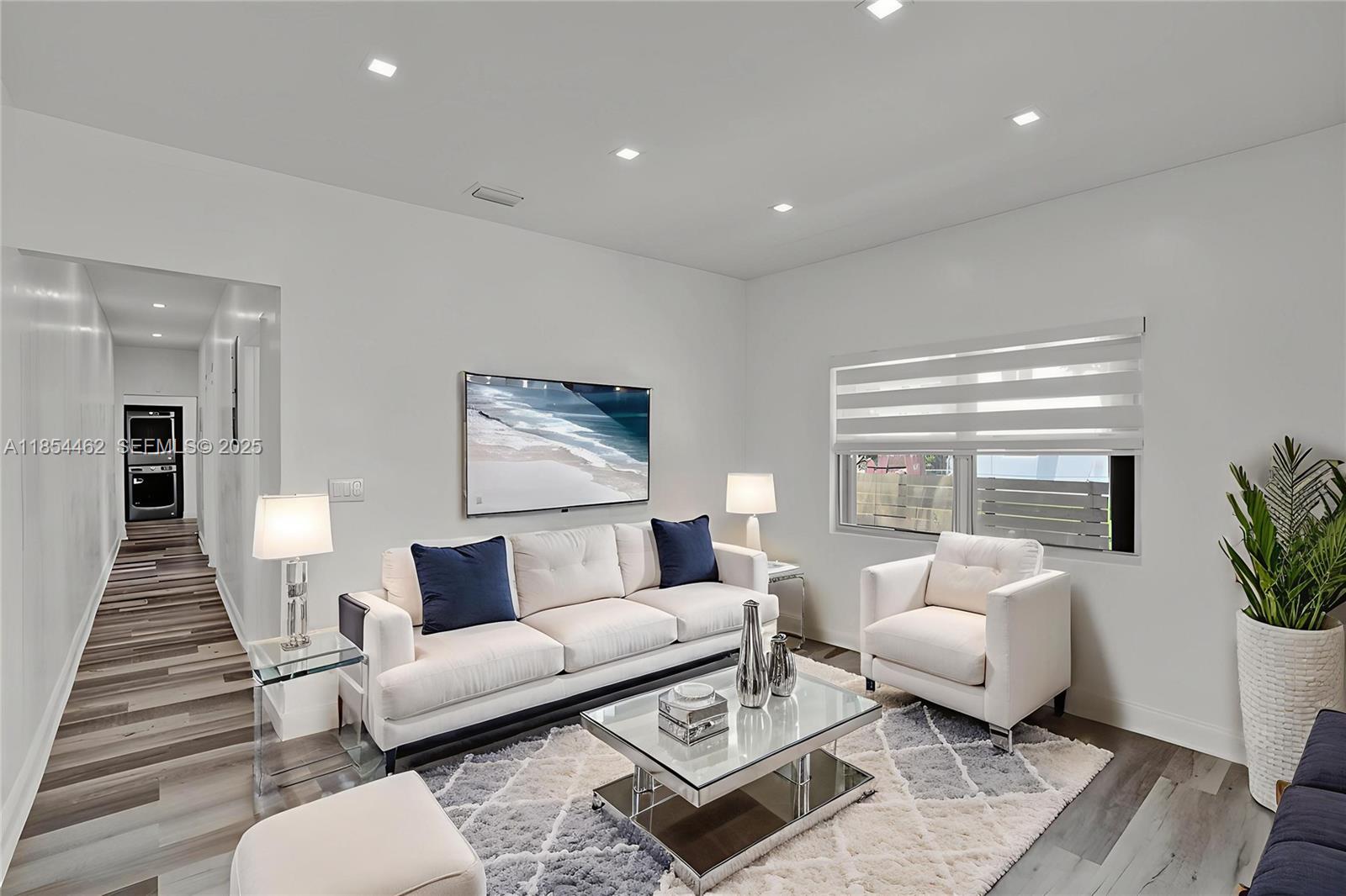 2137 Southwest 4th Street Miami, FL 33135 - Photo 11 of 27 a living room with furniture and wooden floor