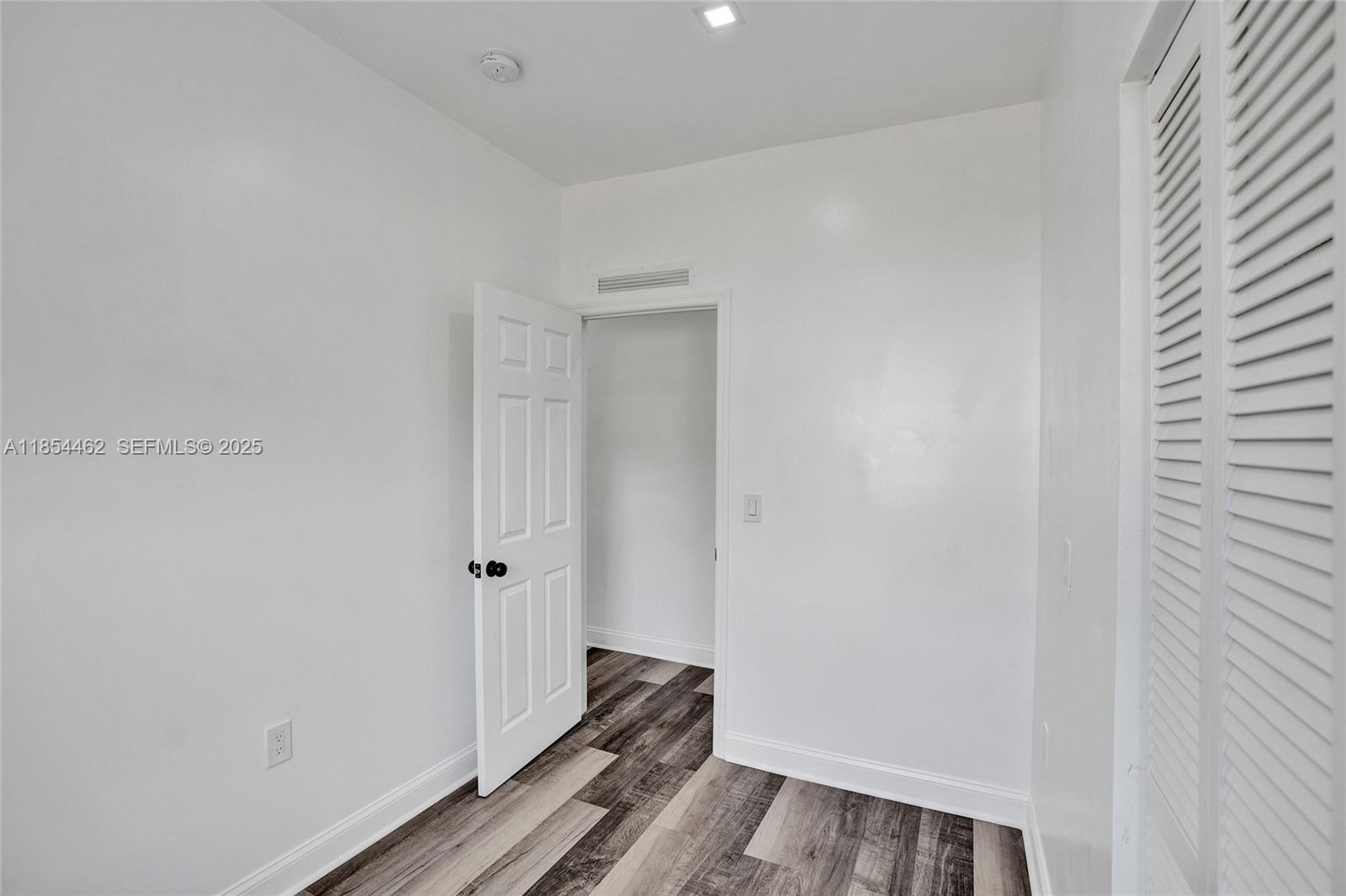 2137 Southwest 4th Street Miami, FL 33135 - Photo 17 of 27 a view of a room with wooden floor