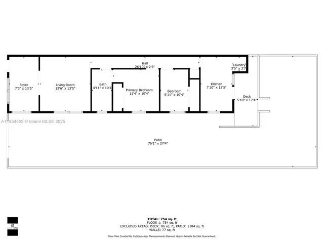 a living room with furniture a couch and a potted plant