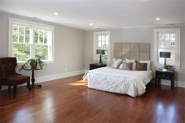 116 Oxford Road Newton, MA 02459 - Photo 7 of 9 a spacious bedroom with a bed and wooden floor