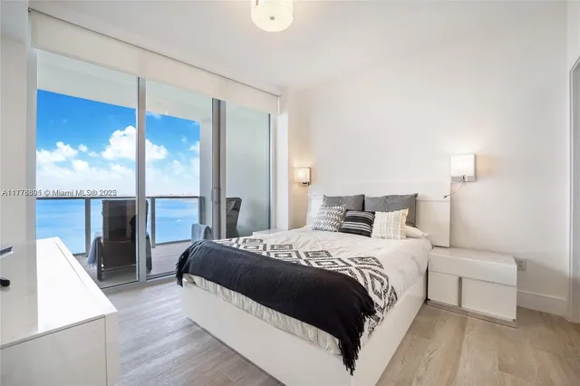 a bathroom with a toilet sink and shower