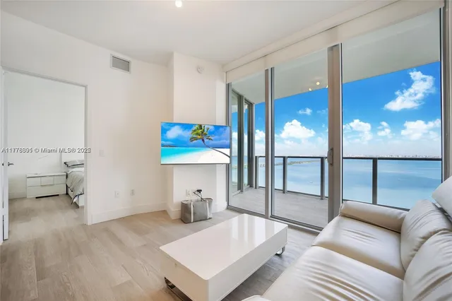 a view of kitchen with cabinets and wooden floor