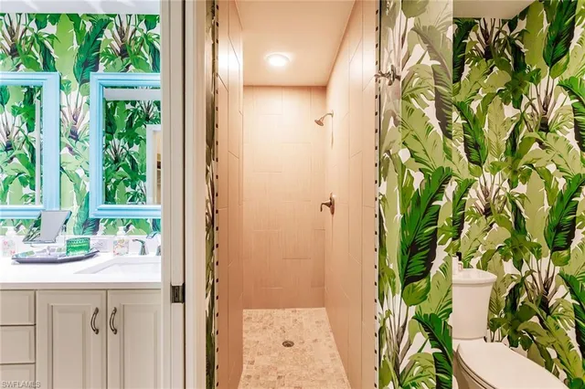 a bathroom with a sink and mirror