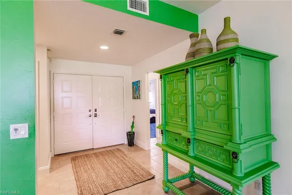 a view of an entryway with garden