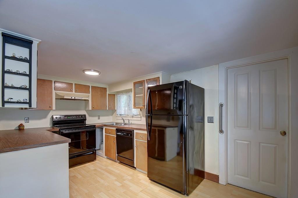 96 Shepard Road Sturbridge, MA 01566 - Photo 11 of 28 a kitchen with stainless steel appliances granite countertop a refrigerator and a stove top oven