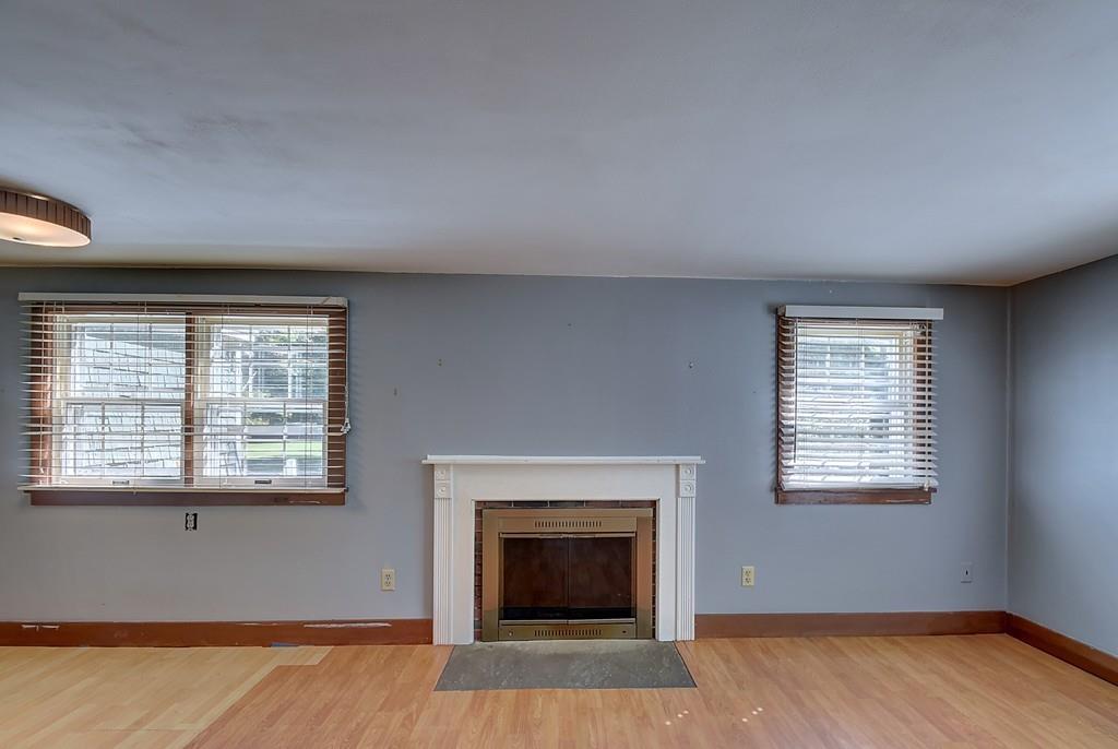 96 Shepard Road Sturbridge, MA 01566 - Photo 15 of 28 a view of an empty room with wooden floor and a window