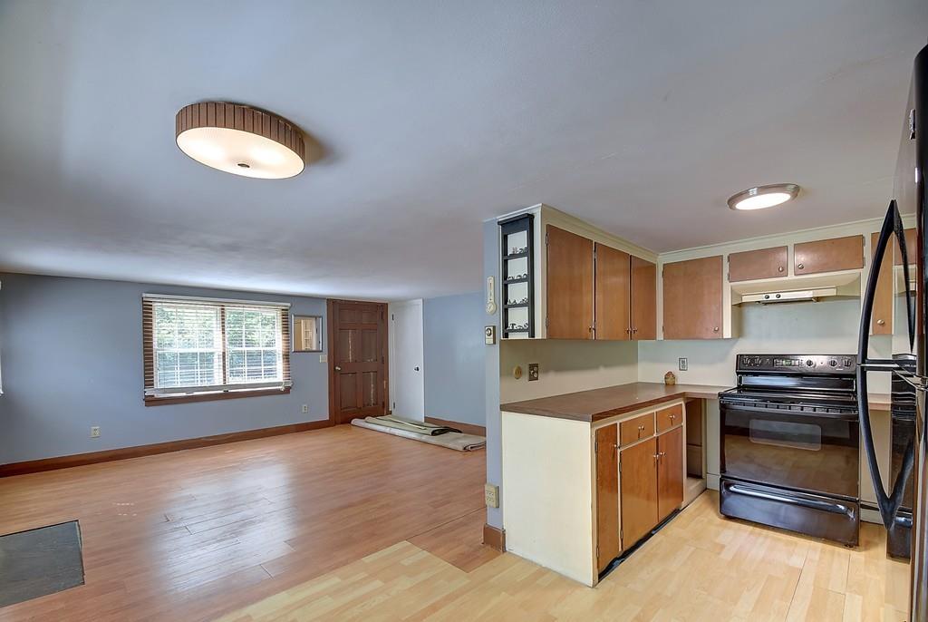 96 Shepard Road Sturbridge, MA 01566 - Photo 10 of 28 a kitchen with a stove a refrigerator and a stove